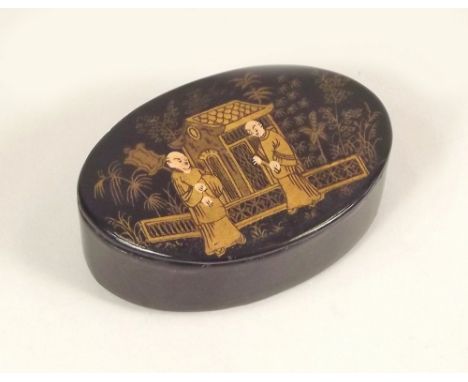 SNUFF BOX. A 19th century papier mache snuff box &amp; contents.