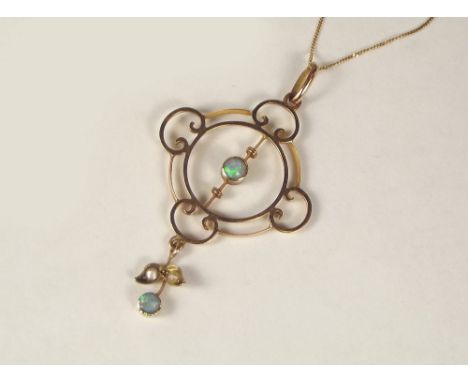 OPAL PENDANT. A 9ct. gold opal &amp; seed pearl pendant, on gold trace chain.