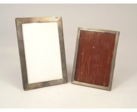 PHOTOGRAPH FRAMES. A 1930's engine turned photograph frame &amp; a modern silver frame.