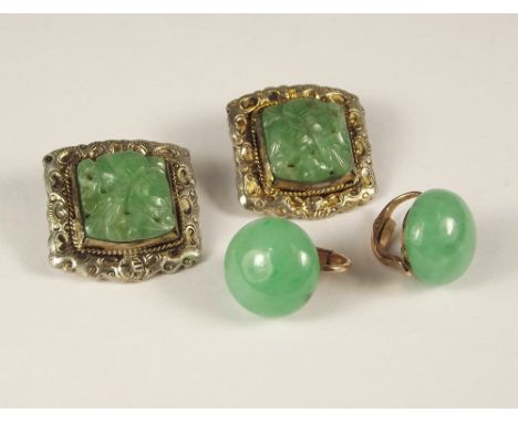 JADE EARRINGS.
A pair of oriental Chinese carved celadon jade earrings, in silver gilt clip mounts & one other pair of jade e