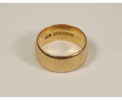 GOLD RING. A gentleman's 18ct. gold band. Approx. 12.9g.