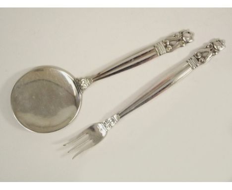 GEORG JENSEN. A Georg Jensen Acorn pattern flat spoon &amp; a matching pickle fork. Georg Jensen Danish stamps.