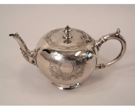 BACHELOR'S TEAPOT. A Victorian bachelor's silver teapot. London 1857. Maker's mark W.RS. Approx. 9½oz.