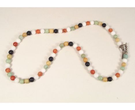 JADE NECKLACE. A coloured jade bead necklace. Each bead approx. 0.8mm. Length 69cm.