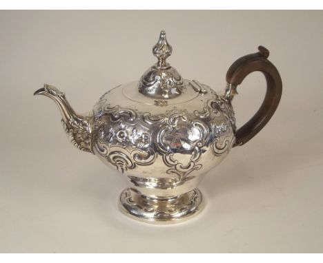 VICTORIAN TEAPOT. An early Victorian teapot with engraved crests. (handle re-attached). London 1845. Approx. 23oz.