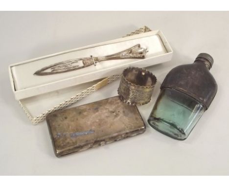 MISCELLANEOUS.
A sterling silver cigarette case, a modern letter opener, a plated napkin ring & a spirit flask with pewter li