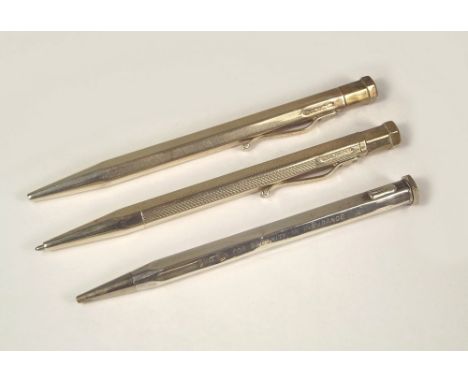 PENCILS. Two silver Yard-O-Led pencils &amp; one other silver pencil (clip missing).