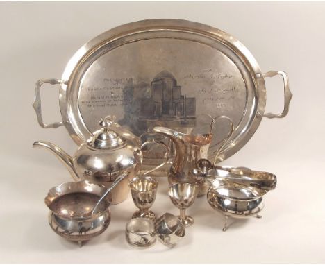 IRAQI SILVER.
An Iraqi silver & niello-decorated tea service, "Presented by PB Basra Customs Officials to Mr N.V. Ringrow wit