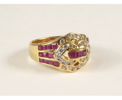 RUBY RING. An 18ct. gold dress ring, set throughout with square cut rubies &amp; brilliant cut diamonds. Approx. 6.3g.