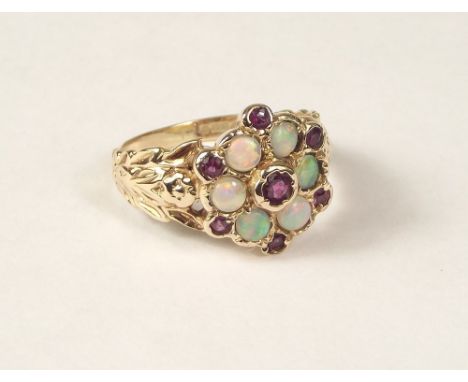 OPAL RING. A modern Victorian opal &amp; garnet ring. Size N.