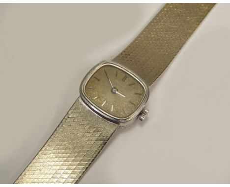 CHOPARD. A lady's Chopard 18ct. white gold wristwatch &amp; strap.