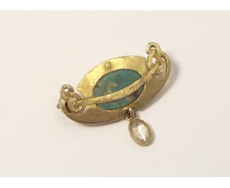 HAND MADE BROOCH. A hand crafted, Celtic inspired brooch, set with turquoise &amp; a clear stone drop. Width 3.4cm.