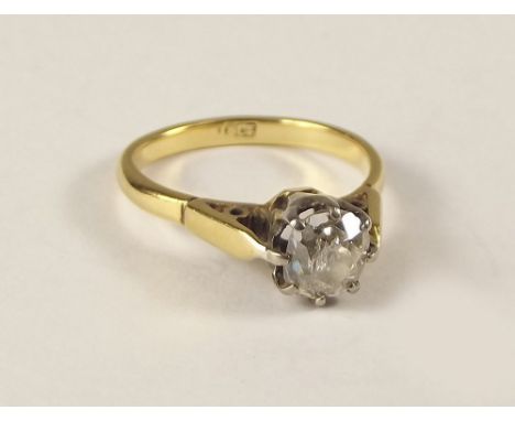 DIAMOND RING. An 18ct. gold solitaire diamond ring in coronet setting. Stone approx. 0.90ct. spread. Size K.