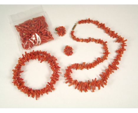 CORAL. A stick coral spiral bracelet, stick coral necklace, clip earrings &amp; loose beads.