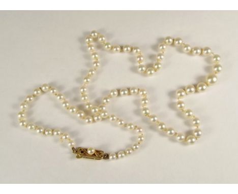 MIKIMOTO PEARLS. A string of 79 Akoya pearls the 14k. clasp with Mikimoto logo. Each pearl graduated between 4.5 &amp; 8mm. G