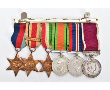 A GROUP OF SIX WORLD WAR TWO MEDALS, on a wearing Bar, to include 1939-45, Africa (1st Army Bar) Italy Stars, Defence &amp; W