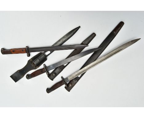 THREE MILITARY BAYONETS AS FOLLOWS, a British WW1 Short Magazine Lee Enfield Bayonet and scabbard, marked 1907 Wilkinson, con