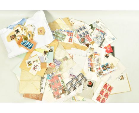 SMALL BOX OF STAMPS IN PACKETS, including GB 1960s-70s mint as singles and small blocks togetherwith the odd earlier item