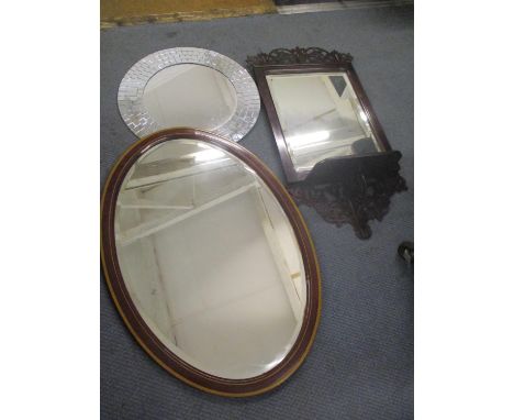 Three mirrors to include a Victorian mahogany wall mirror having pierced fretwork and shelf below 