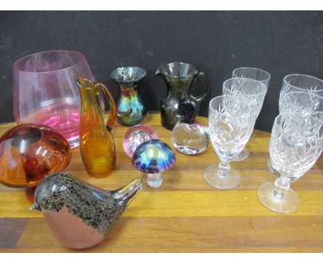 A Caithness Moon Crystal pink glass paperweight and other examples, a Caithness pink glass vase, a Murano paperweight in the 