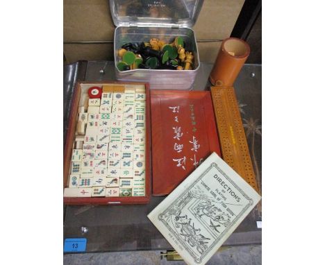 A vintage Chinese game of four winds, a matchstick counter panel, mixed dice and a vintage sandwich box containing wooden che