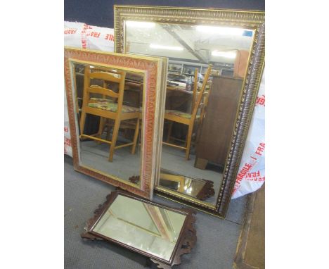 Three wall mirrors to include an overmantle bevelled glass mirror 