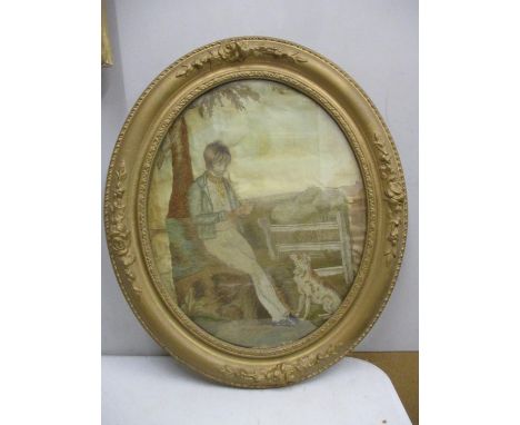 A Victorian tapestry on silk of a boy and a dog, 17" x 14", framed and glazed A/F 