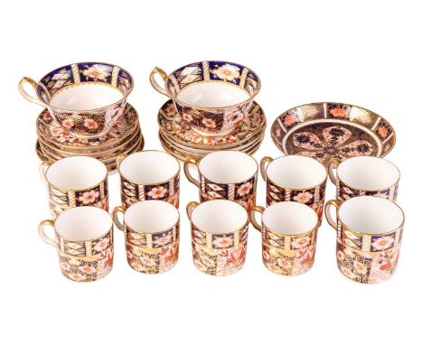A group of six Royal Crown Derby 'Old Imari' 2541 coffee cans and saucers, a group of four demitasse cups and saucers and an 