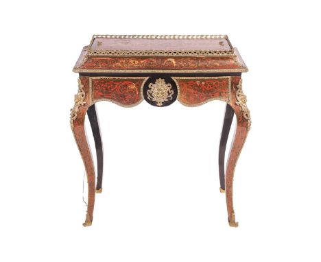 A Napoleon III red Boulle rectangular jardiniere table with a moulded pagoda top, pierced gilt gallery and removable central 