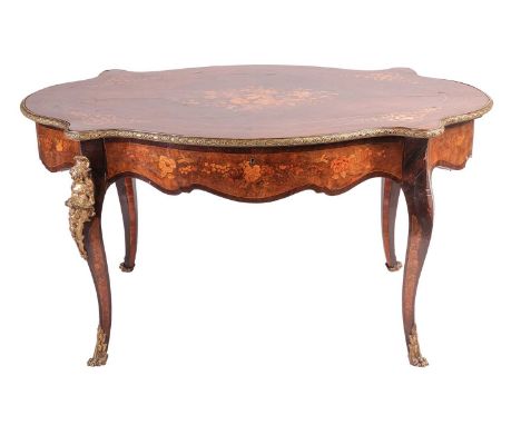 Napoleon III floral marquetry inlaid figured rosewood centre table of cartouch outline with a single freeze drawer and gilt m