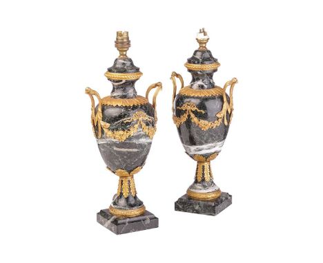 A pair of Louis XVI-style variegated green marble and ormolu urn form table lamps with applied handles and swags above square