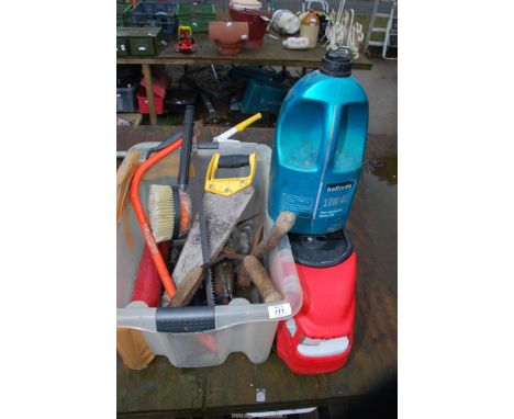 A box of tools, motor oil, etc.