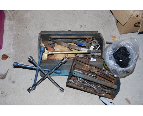 A tool box and contents, two wheel braces, etc.