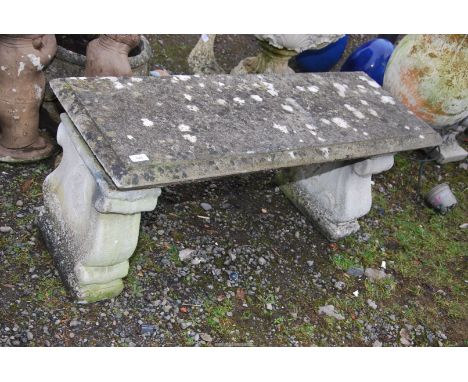 A concrete garden bench, 42" wide x 16'' deep x 17" high.