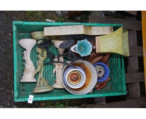 A box of pricket stands, enamel bucket, etc.