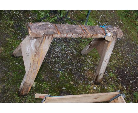 A wooden saw bench.