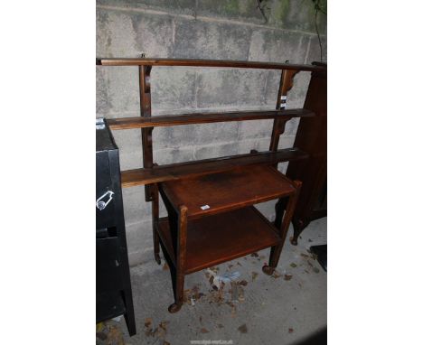 A wall mounted shelf unit, 49" long x 23" high x 6" deep, and a tea trolley 