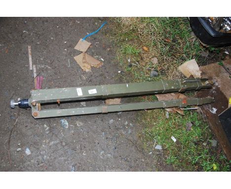A metal tripod.
