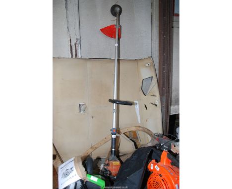 A "Wolf Tools" Strimmer. Good compression.