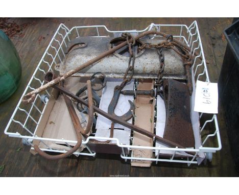 A quantity of metal items, hooks, chains, axe head etc.