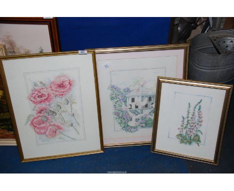 Three gilt framed tapestry flower pictures.