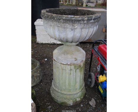 A large concrete planter on column, 21 1/2" diameter x 39" high.  