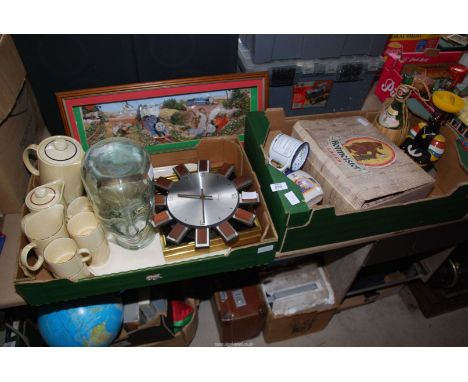 Two boxes to include: Poole pottery, a glass head, clocks, glasses, bottles, etc.