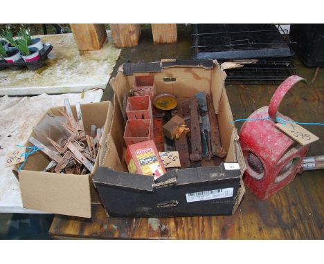 A red roadworks lamp, met post, door hinges, mole traps, etc.