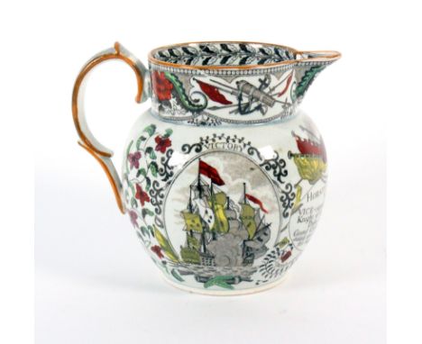 An English pottery jug, commemorating Lord Nelson, early 19th century, extensively printed and painted with an oval portrait 