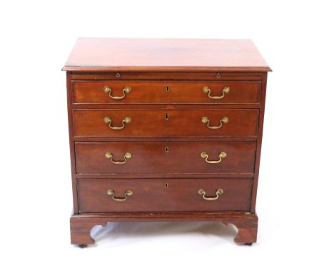 A late Georgian mahogany chest of four long graduated drawers, below a brushing slide, brass swan neck handles, bracket feet,