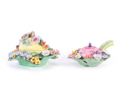 A 19th Century Elbogen inkwell in the form of a floral encrusted lemon, 17.5cm, blue R mark and another as a flower head as l