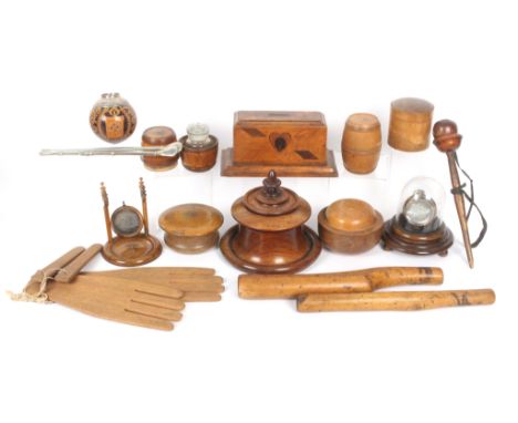 A collection of treen comprising an inlaid money box, 20.5cm, two watch stands one with glass dome and with a silver pocket w