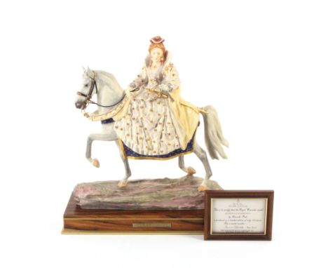 A Royal Worcester limited edition model of Queen Elizabeth I, wearing full regalia and mounted on a grey horse, with wooden p