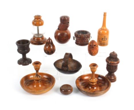 Eleven pieces of treen comprising a pair of Jerusalem Brighton bun candlesticks, 11.5cm dia, a turned mahogany sovereign ball